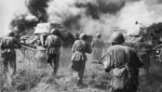 Soviet infantry advancing behind T-34 tanks during the Battle of Orel, Russia, early Aug 1943