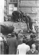 Hungarian soldiers inspecting a T-34/85 medium tank during the 1956 Revolution, Budapest, Hungary, Oct 1956