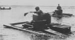 T-37A amphibious tanks traveling across a river, 1930s