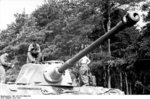 A German Tiger II tank being painted, France, Jun 1944, photo 3 of 3