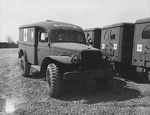 New Dodge WC54 3/4-ton field ambulances awaiting embarkation overseas, Detroit, Michigan, United States, 1943-1945