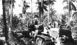 155mm Gun M1 of the US Marine Corps being towed on the island of Rendova, Solomon Islands, Jul 1943