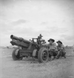 Australian crew of a Baby 25 pr field gun in Markham Valley, New Guinea, 28 Aug 1944; they were Sergeant J. O. Kennedy, gunner J. L. Kirby, and gunner T. M. Naughtin