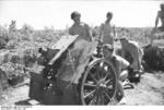 German soldiers drilling with a 7.5 cm le.IG 18 field gun, Russia, Jun-Jul 1943, photo 1 of 2