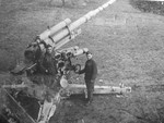 Slovakian resistance fighters posing next to a captured German 8.8 cm FlaK 37 L/56 gun, circa 1944