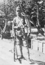 Japanese Army Private 2nd Class with a Type 38 rifle, date unknown