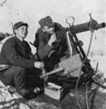 Norwegian Army machine gun crew with Colt M/29 heavy machine gun, near Narvik, Norway, May 1940