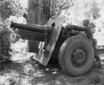 US Army Sergeant James Aets and Corporal Charles Hines operating a 155 mm Howitzer Carriage M1917 or M1918 howitzer, date unknown