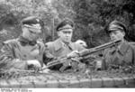 A German general inspecting troops at San Felice Circeo, Italy, 26 Dec 1943; note FG 42 rifle