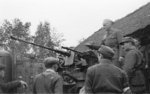 Resistance fighters of the Kampinos Regiment with a captured German 2 cm FlaK 38 gun during the Warsaw Uprising, Poland, Sep 1944