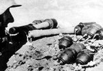 German soldier with Model 39 Eihandgranate and Model 24 Stielhandgranate grenades, date unknown