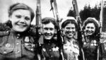 Female Soviet snipers with Mosin-Nagant rifles, circa 1940s
