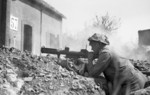 British soldier with PIAT at Saint-Martin-des-Besaces, Basse-Normandie, France, 1 Aug 1944