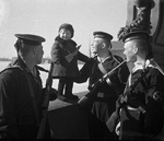 Soviet Baltic Fleet sailors with orphan Lucy, Leningrad, Russia, May 1943
