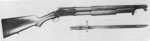 Winchester Model 1897 trench gun with heat shield, bayonet adapter, and M1917 bayonet