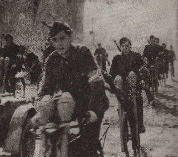 Hitler Youth troops delivering anti-tank weapons to the front lines, date unknown