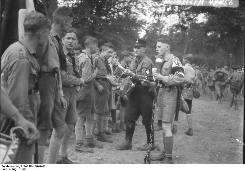Members of Hitler Youth receiving rations at a camp near Potsdam, Germany, 1932