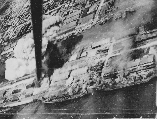 Takao (now Kaohsiung) harbor, Taiwan under US Navy carrier aircraft attack, 12 Oct 1944, photo 1 of 6
