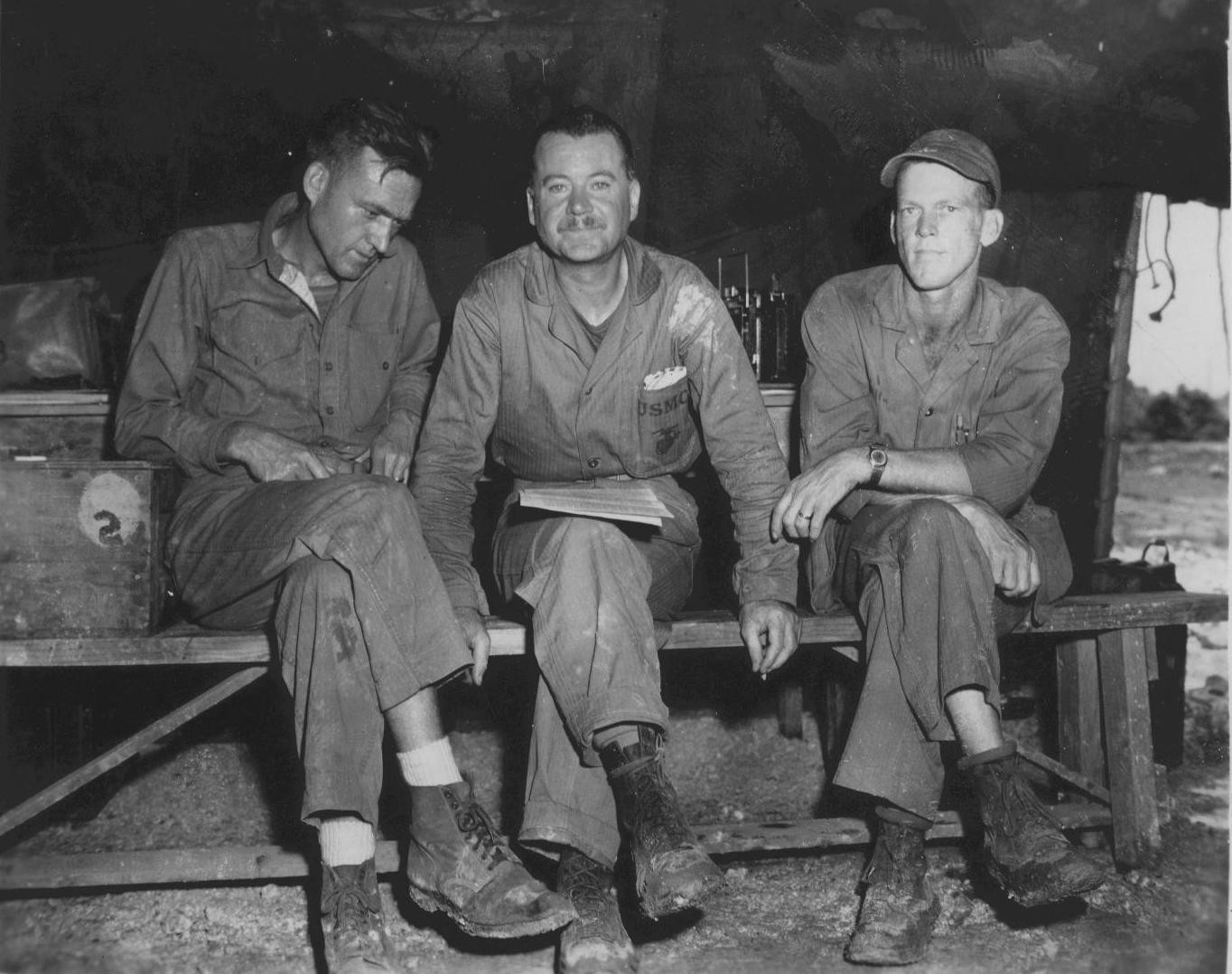 Public relations personnel of US Marine Airfield Group 31 Sgt Claude Canup, Sgt James Driscoll, and TSgt Charles Corkran, Yontan Airfield, Okinawa, 1945