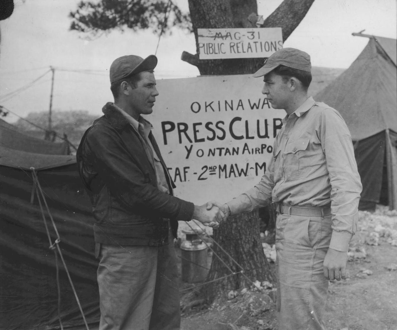 CBS war correspondent Tim Leimert and USMC pilot 1st Lt Herbert Groff, Yontan Airfield, Okinawa, Japan, 23 Apr 1945