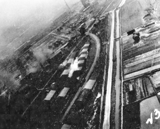 Kagi butanol plant under attack by PV-1 aircraft of US Navy squadron VPB-137, Kagi (now Chiayi), Taiwan, 3 Apr 1945, photo 1 of 2