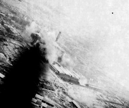 Kagi butanol plant under attack by PV-1 aircraft of US Navy squadron VPB-137, Kagi (now Chiayi), Taiwan, 3 Apr 1945, photo 2 of 2