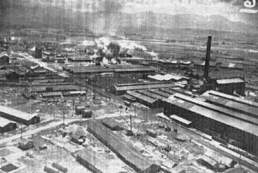 Kagi butanol plant under attack by B-25 bombers of 3rd Bombardment Group, USAAF 5th Air Force, Kagi (now Chiayi), Taiwan, 3 Apr 1945, photo 4 of 5