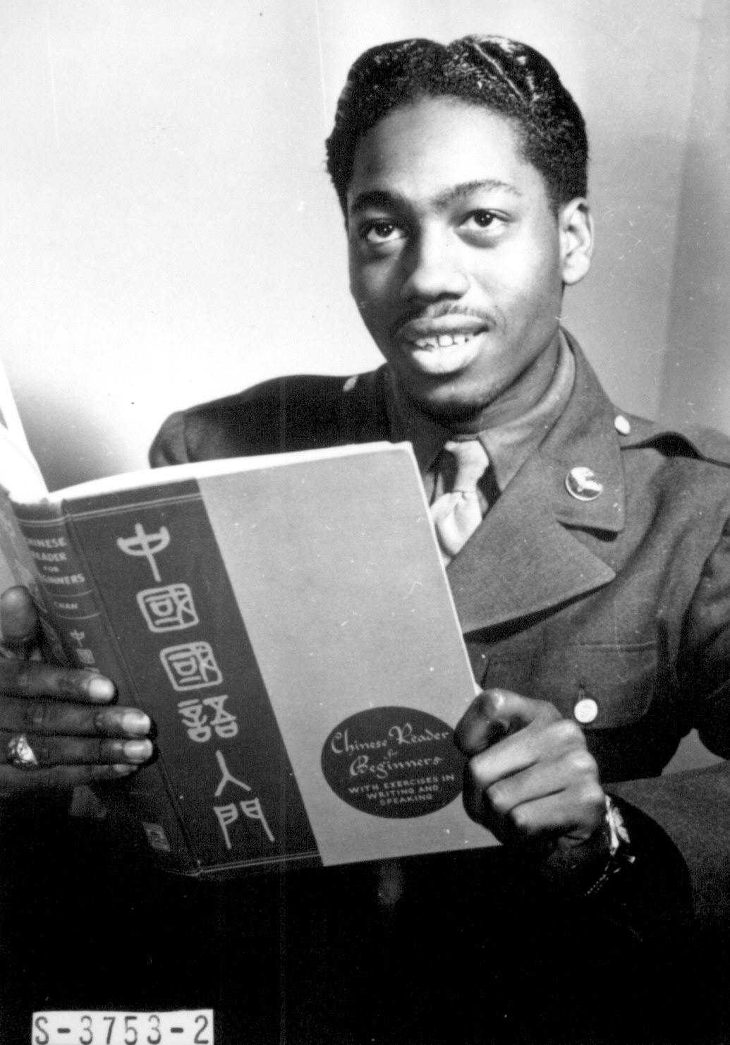 African-American US Army Private Lloyd A. Taylor, a 21-year-old transportation dispatcher at Mitchel Field, New York City, New York, United States studying Chinese, date unknown