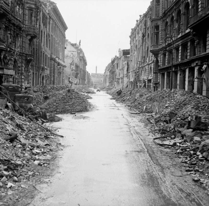 Scene of destruction in a Berlin, Germany street just off the Unter den Linden, 3 Jul 1945