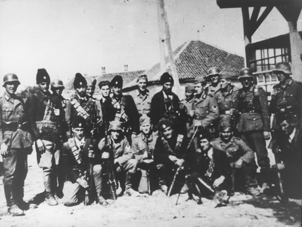 Chetnik and German troops in a village in the Serbia region of Yugoslavia, 1941-1945