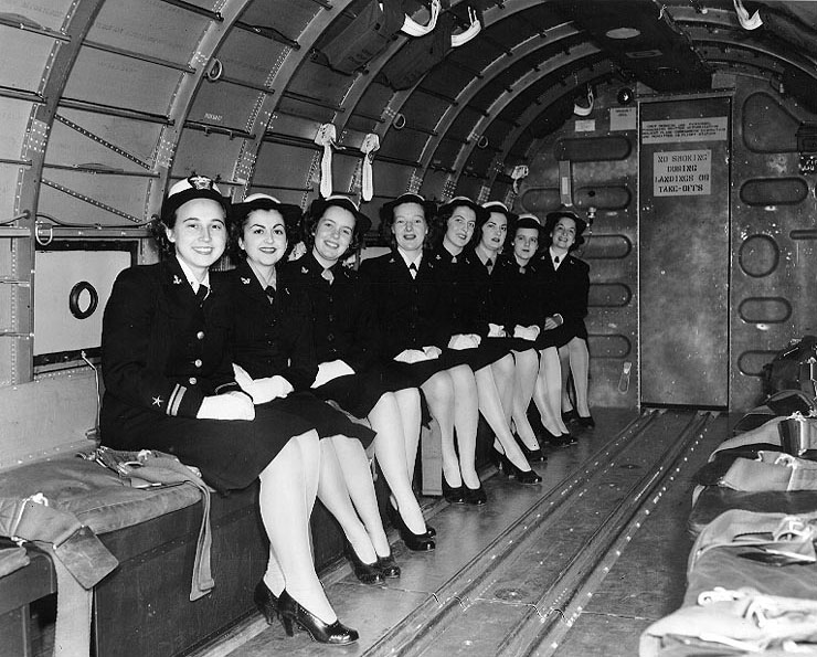 WAVES personnel traveling aboard a R4D-6 transport aircraft while en route to Naval Air Station, Olathe, Kansas, United States, 13 Nov 1944