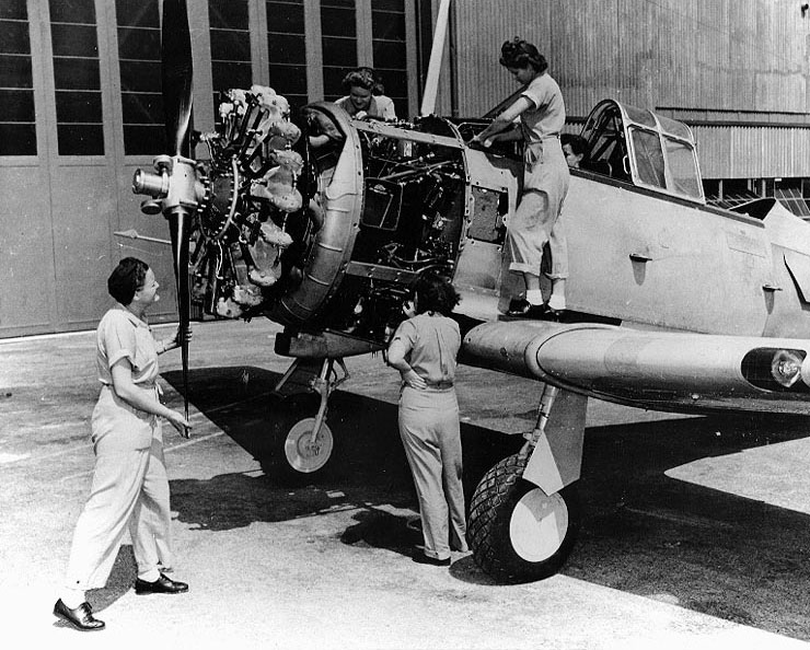 WAVES Aviation Machinist's Mates working on a SNJ training plane and its Pratt & Whitney R-1340 radial engine,  Naval Air Station, Jacksonville, Florida, United States, 24 July 1943