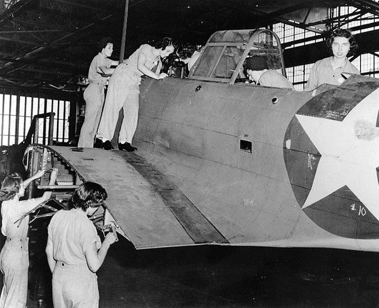 WAVES Aviation Metalsmiths and Aviation Machinist's Mates working on a SBD Dauntless aircraft, Assembly and Repair Department,  Naval Air Station, Jacksonville, Florida, United States, 24 Jul 1943