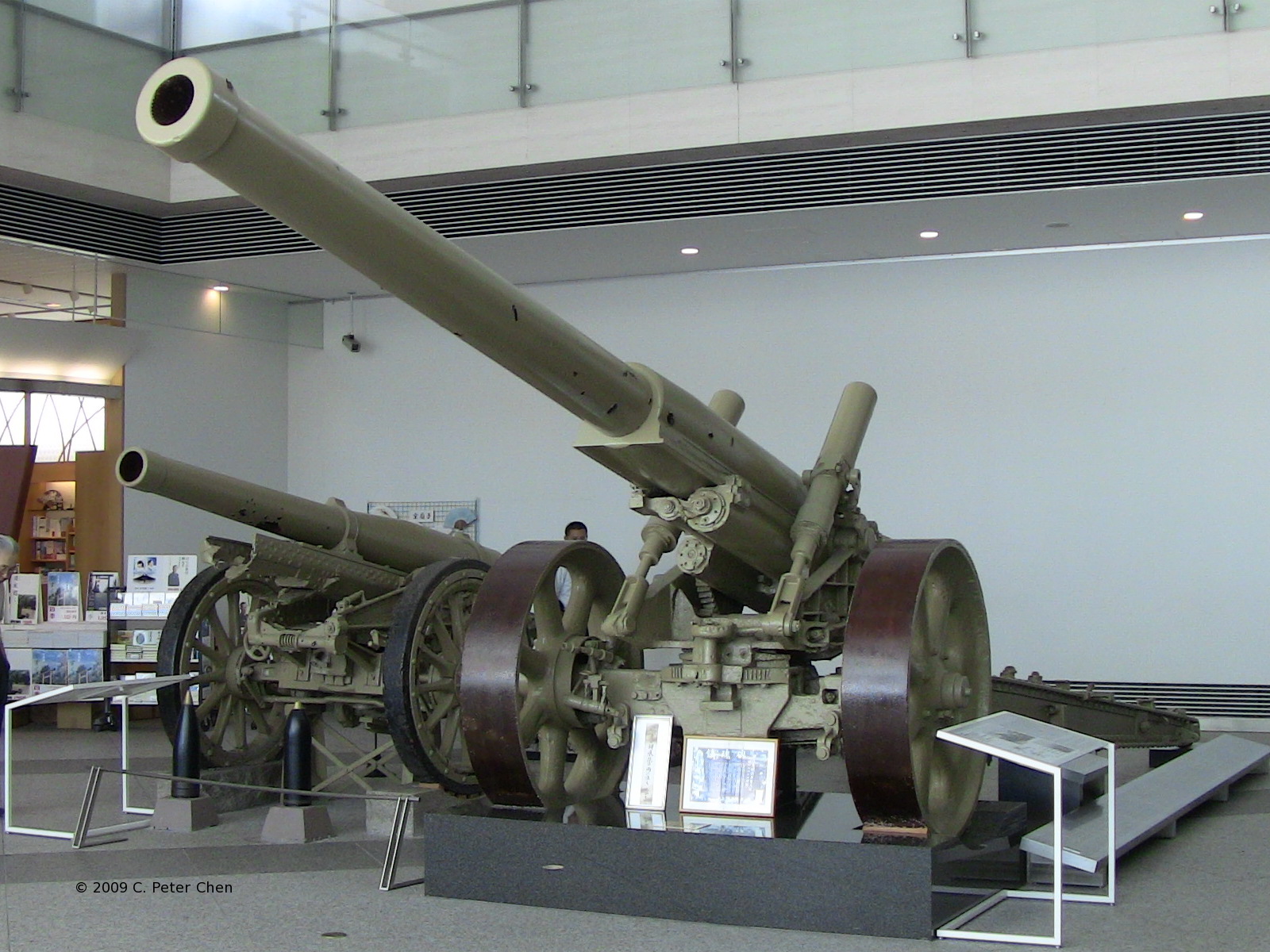 Type 89 15-cm cannon on display at Yushukan Museum, Tokyo, Japan, 7 Sep 2009, photo 1 of 3; note Type 96 15-cm howitzer in background