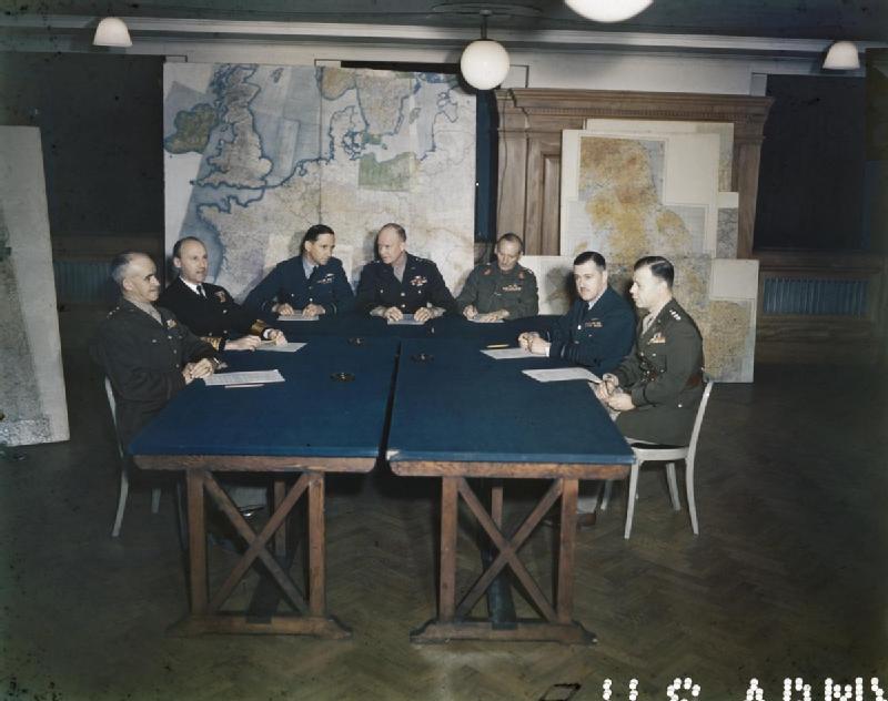 Bradley, Ramsay, Tedder, Eisenhower, Montgomery, Leigh-Mallory, and Smith at a SHAEF conference in London, England, United Kingdom, 1 Feb 1944, photo 3 of 7