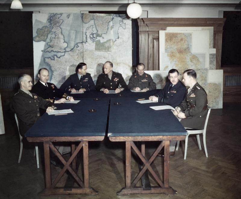 Bradley, Ramsay, Tedder, Eisenhower, Montgomery, Leigh-Mallory, and Smith at a SHAEF conference in London, England, United Kingdom, 1 Feb 1944, photo 4 of 7