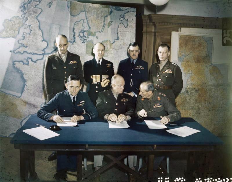 Bradley, Ramsay, Tedder, Eisenhower, Montgomery, Leigh-Mallory, and Smith at a SHAEF conference in London, England, United Kingdom, 1 Feb 1944, photo 7 of 7