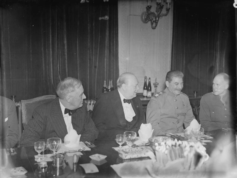 Franklin Roosevelt, Winston Churchill, and Joseph Stalin at the Victorian Drawing Room of the British Legation in Tehran, Iran, 30 Nov 1943 in celebration of Churchill's 69th birthday