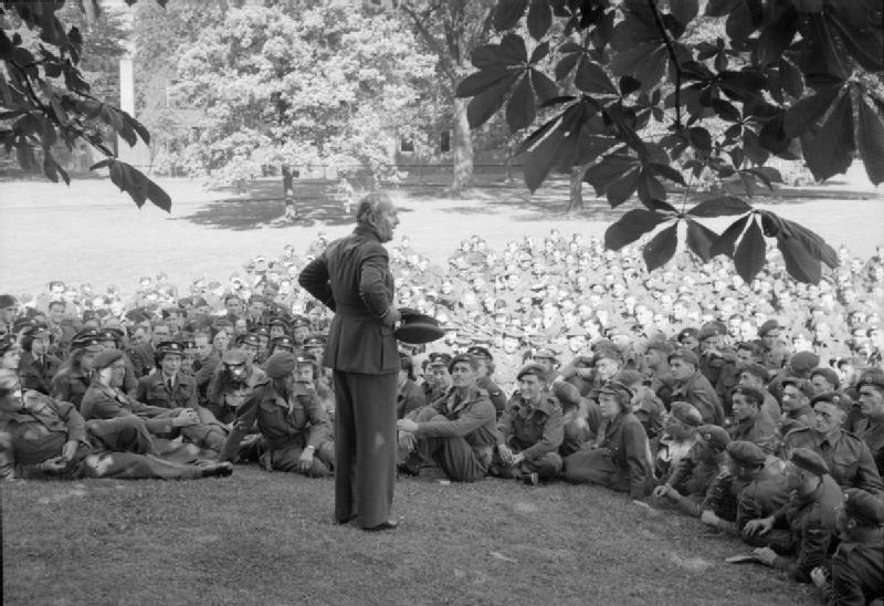 Arthur Coningham speaking with men and women of Air Formation Signals section of Headquarters Unit of 2nd Allied Tactical Air Force, Bad Eilsen, Germany, Germany, early Jul 1945