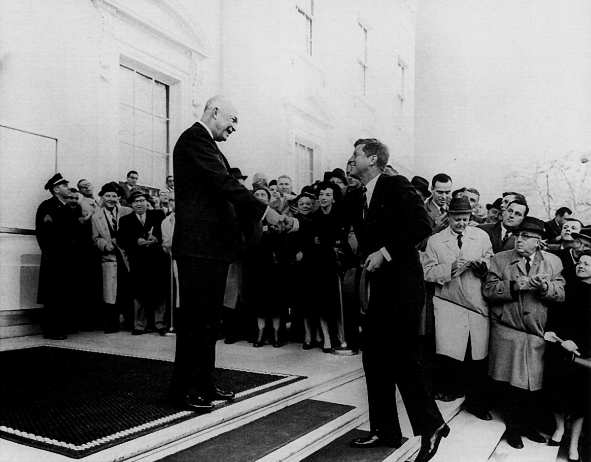 US President Dwight Eisenhower greeting President-Elect John Kennedy, 6 Dec 1960