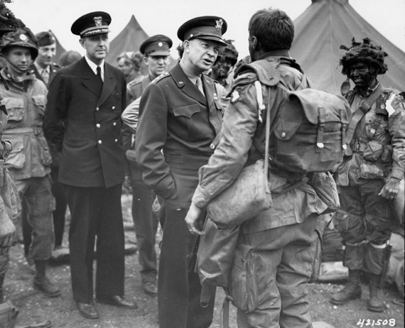 General Dwight Eisenhower speaking to airborne troops, England, United Kingdom, 5 Jun 1944; note Major General Ray Barker in background