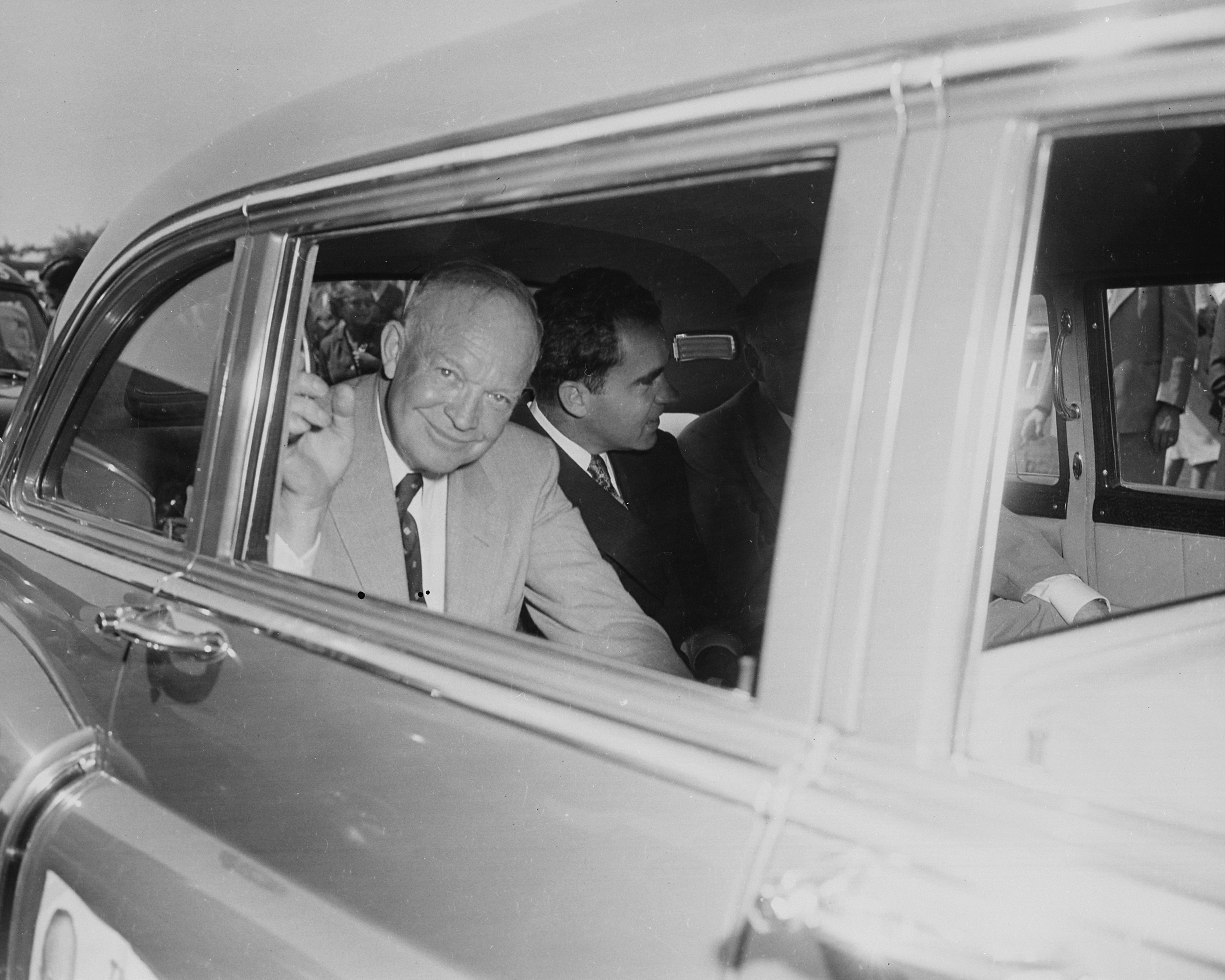 US presidential candidate Dwight Eisenhower and vice presidential candidate Richard Nixon in a car at Washington National Airport, Arlington, Virginia, 10 Sep 1952