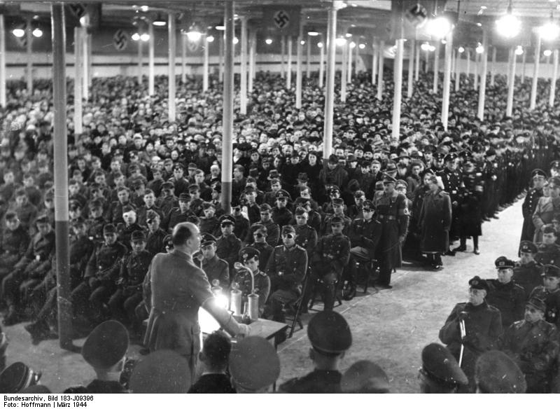 Greiser speaking at a ceremony that celebrated reaching one million German resettlers in Wartheland, Posen, Germany, 16 Mar 1944