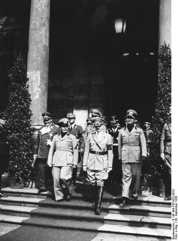 Mussolini and Hitler, Munich Conference, Germany, 29 Sep 1938, photo 1 of 2; Göring, Himmler, and Ciano in background