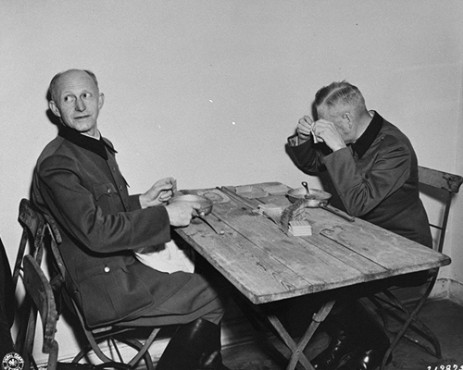 Alfred Jodl and Wilhelm Keitel at a makeshift dining room during the Nuremberg Trials, Germany, 1945-1946