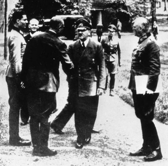 Stauffenberg and Puttkamer greeting Hitler at Wolf's Lair, Rastenburg, East Prussia, Germany, 15 Jul 1944; note Keitel at right
