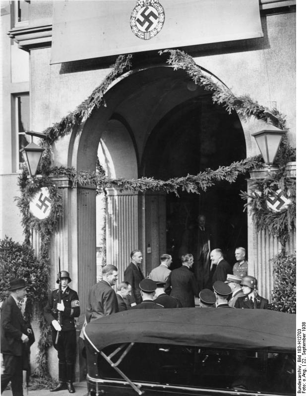 Adolf Hitler and Neville Chamberlain at Hotel Dreesen, Bad Godesberg, Germany, 22 Sep 1938; Wilhelm Keitel, Paul Otto Gustav Schmidt, Joachim von Ribbentrop, and Dörnberg also present