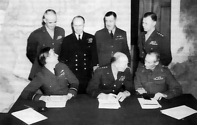 Bradley, Ramsay, Tedder, Eisenhower, Montgomery, Leigh-Mallory, and Smith at a SHAEF conference in London, England, United Kingdom, 1 Feb 1944, photo 6 of 7