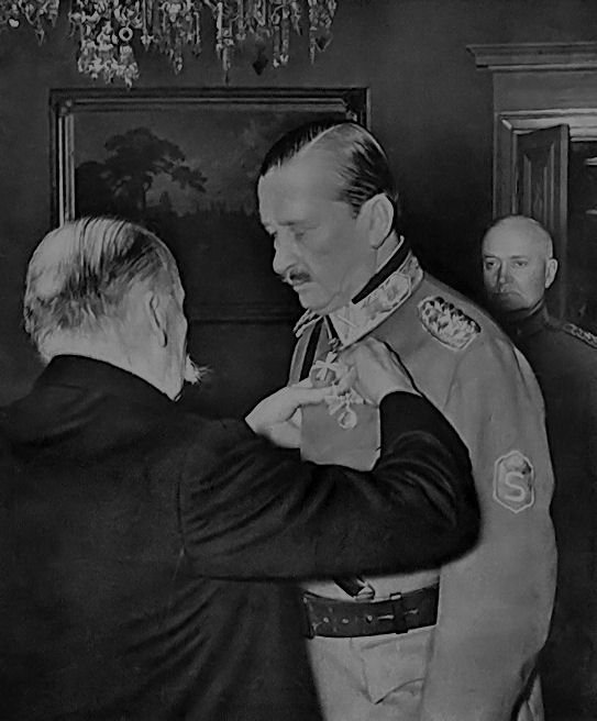 Field Marshal Mannerheim being decorated the Order of the Cross of Liberty by Finnish President Kyösti Kallio, 1940