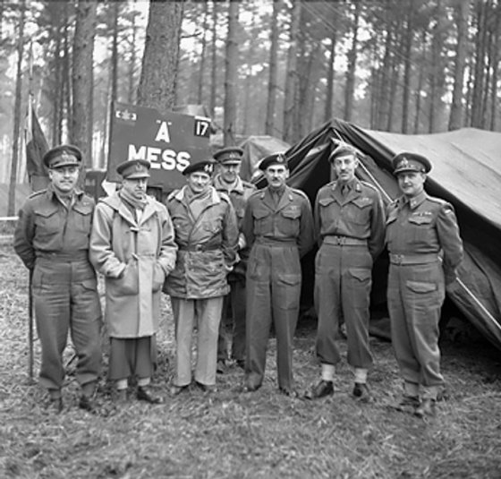 Montgomery visiting Canadian troops in the Kleve-Goch sector, Germany, 26 Feb 1945; left to right: Vokes, Crerar, Montgomery, Horrocks, Simonds, Spry, Mathews